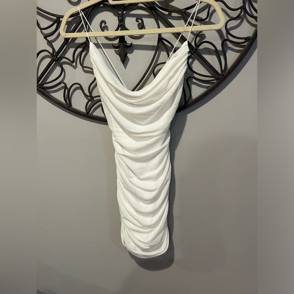 White garage, mini body con swoop neck, dress with inner lining worn once XS